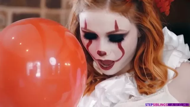 A red-haired girl and her boyfriend are clowns who love sex