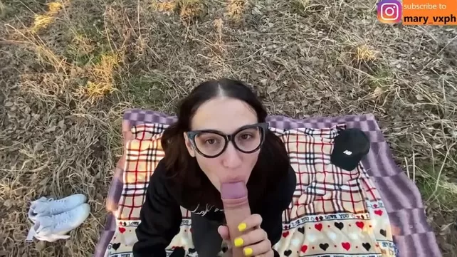 Juicy suction from a girl with glasses and fucking in nature